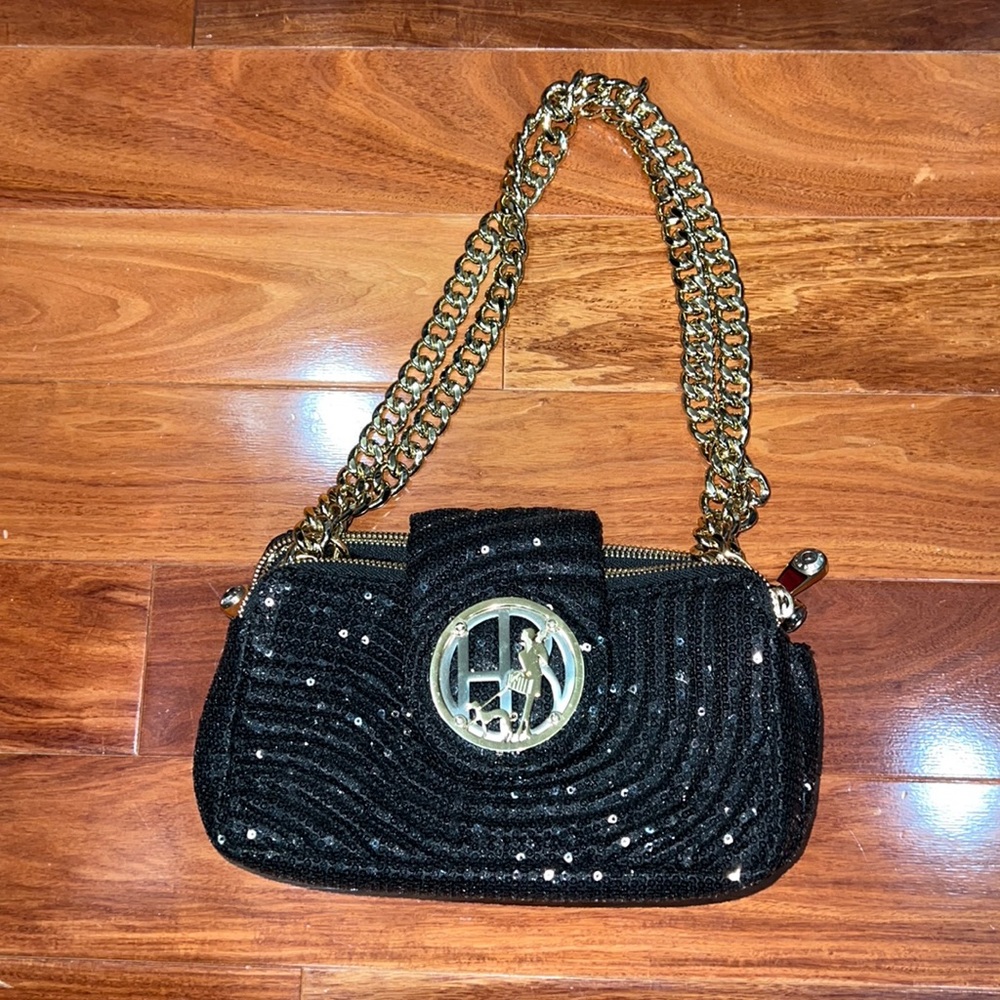 Beautiful NEW Henri Bendel black sequin purse with gold chain.